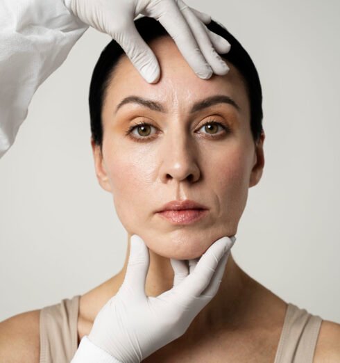 front-view-hands-touching-woman-s-face