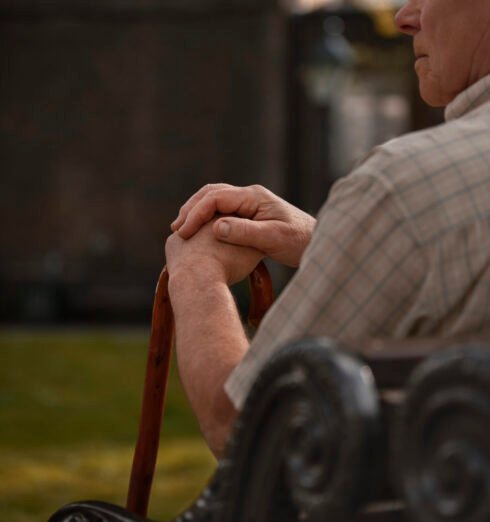 side-view-old-man-sitting-bench